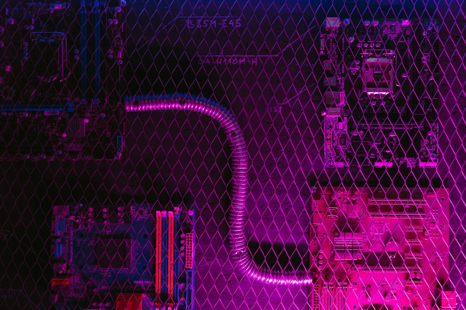 Best Agentic AI Security Tools in 2026: Top 7 Compared — Abstract image of motherboard circuits with a neon glow and diagonal…