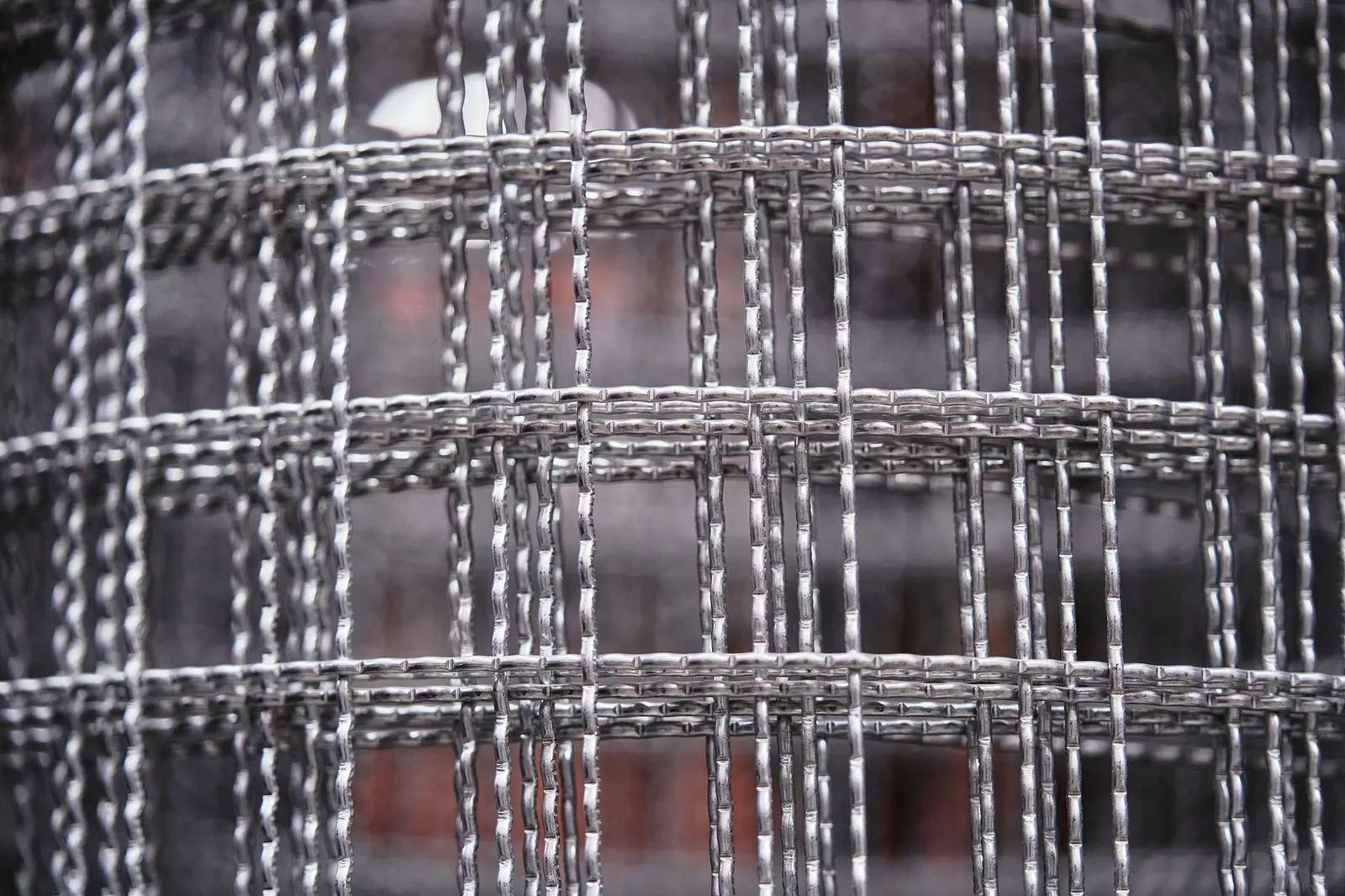 Best AI Security Tools in 2026 — Detailed close-up of a metal wire mesh with intricate patterns and textures, ideal for indus…