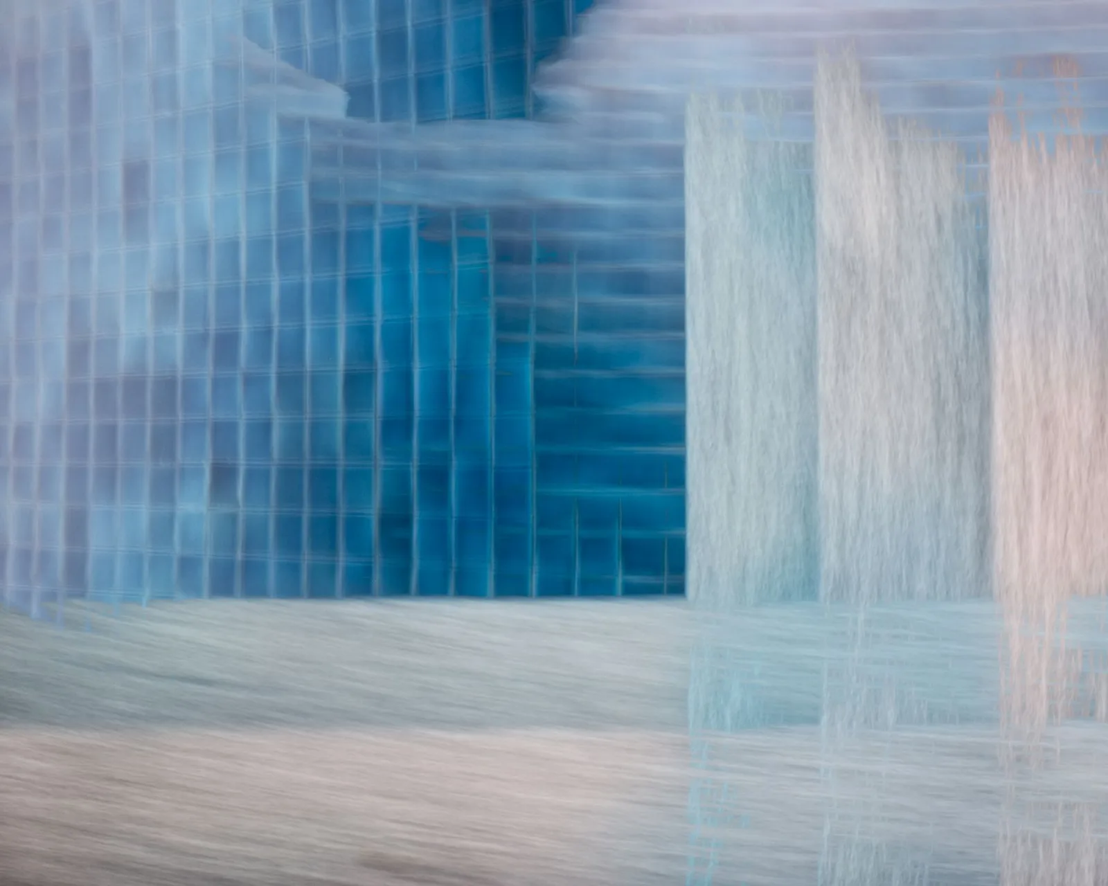 Best IAM Tools in 2026 — Abstract image featuring blue and gray geometric patterns and textures.