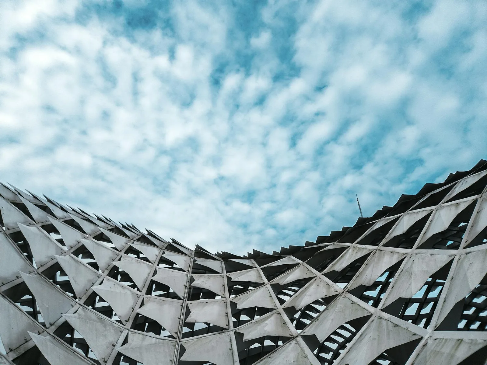 Govern Maturity Assessment: Where Most Programs Fall Short — Dynamic view of a modern architectural structure against a cloud…