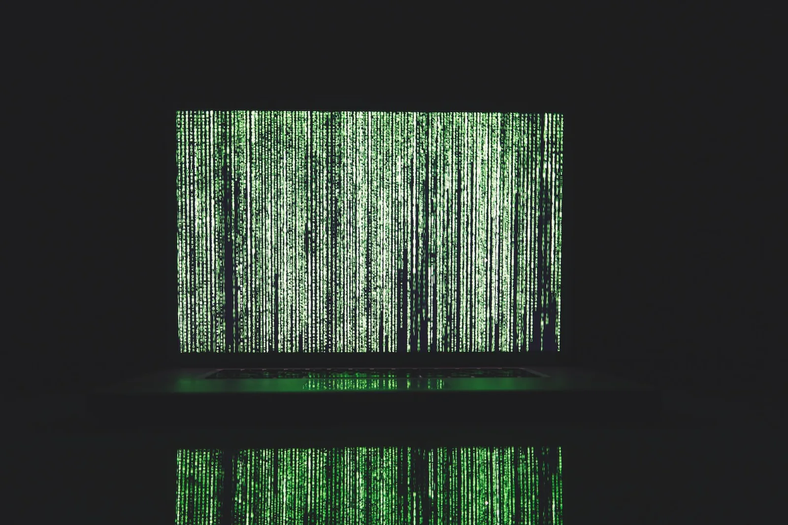 Best Quantum Security Tools in 2026 — Abstract depiction of green matrix code on a computer monitor.