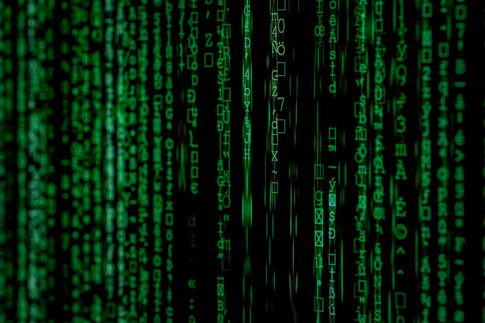 Best Static Application Security Testing Tools in 2026: Top 8 Compared — Abstract green matrix code background with binary st…